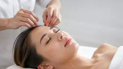 User receiving acupuncture treatment