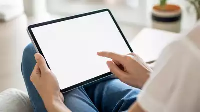 User submitting online form on tablet